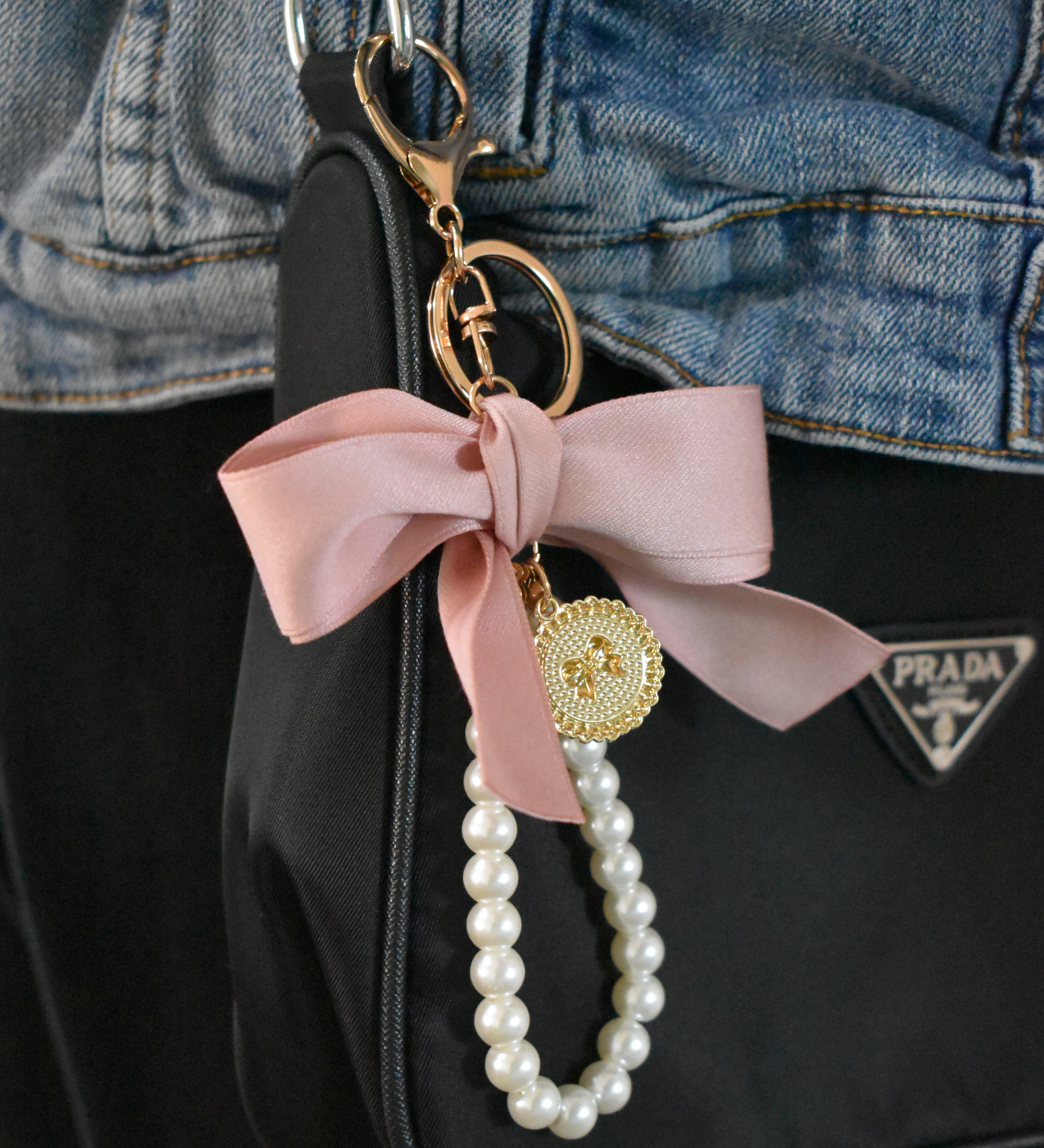 Gold bow with pearl bag charm clip accessory