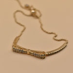 Gold Bow CZ Bracelet Adjustable with cubic zirconia charm
