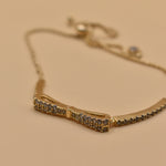 Gold Bow CZ Bracelet Adjustable with cubic zirconia charm