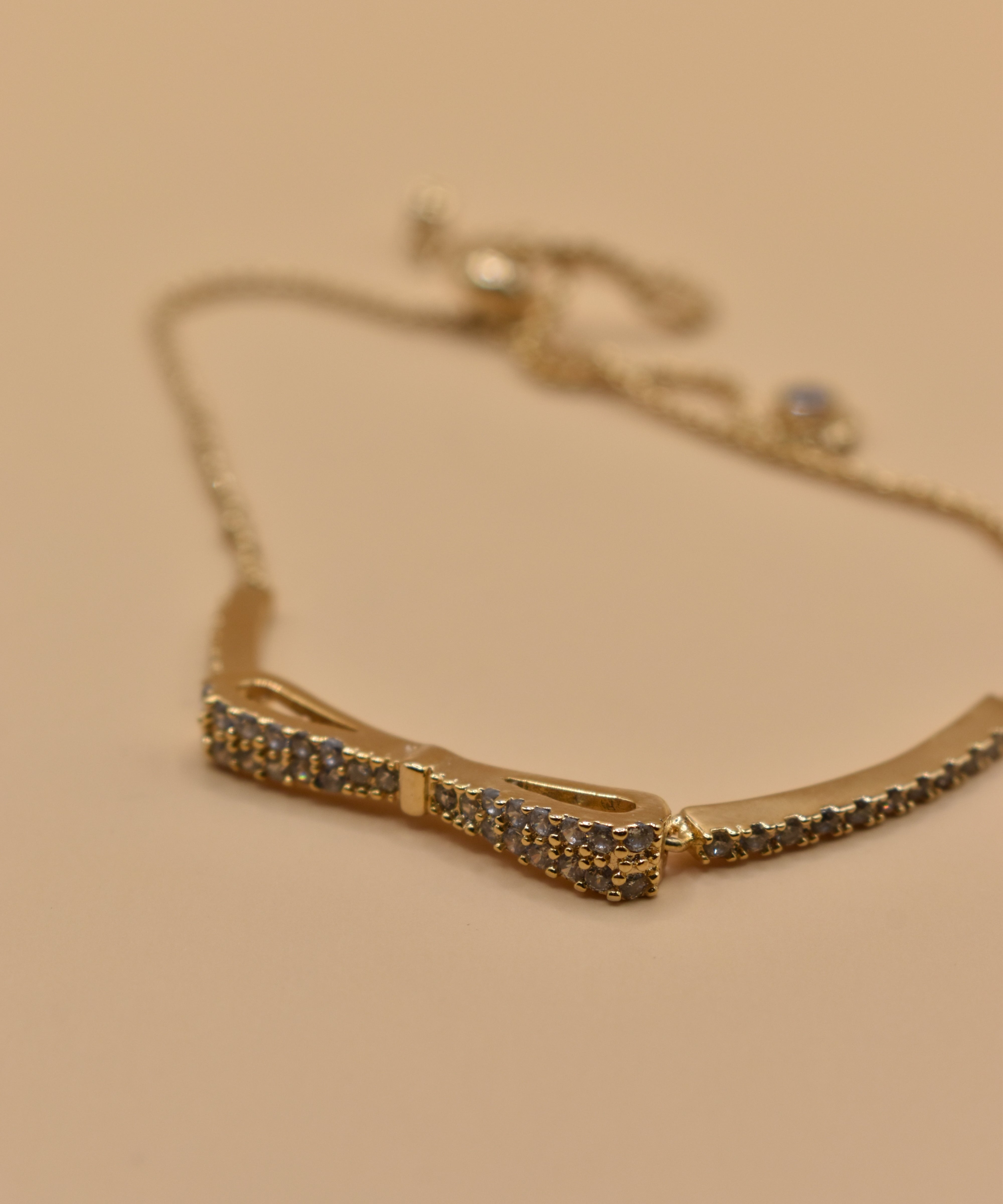Gold Bow CZ Bracelet Adjustable with cubic zirconia charm