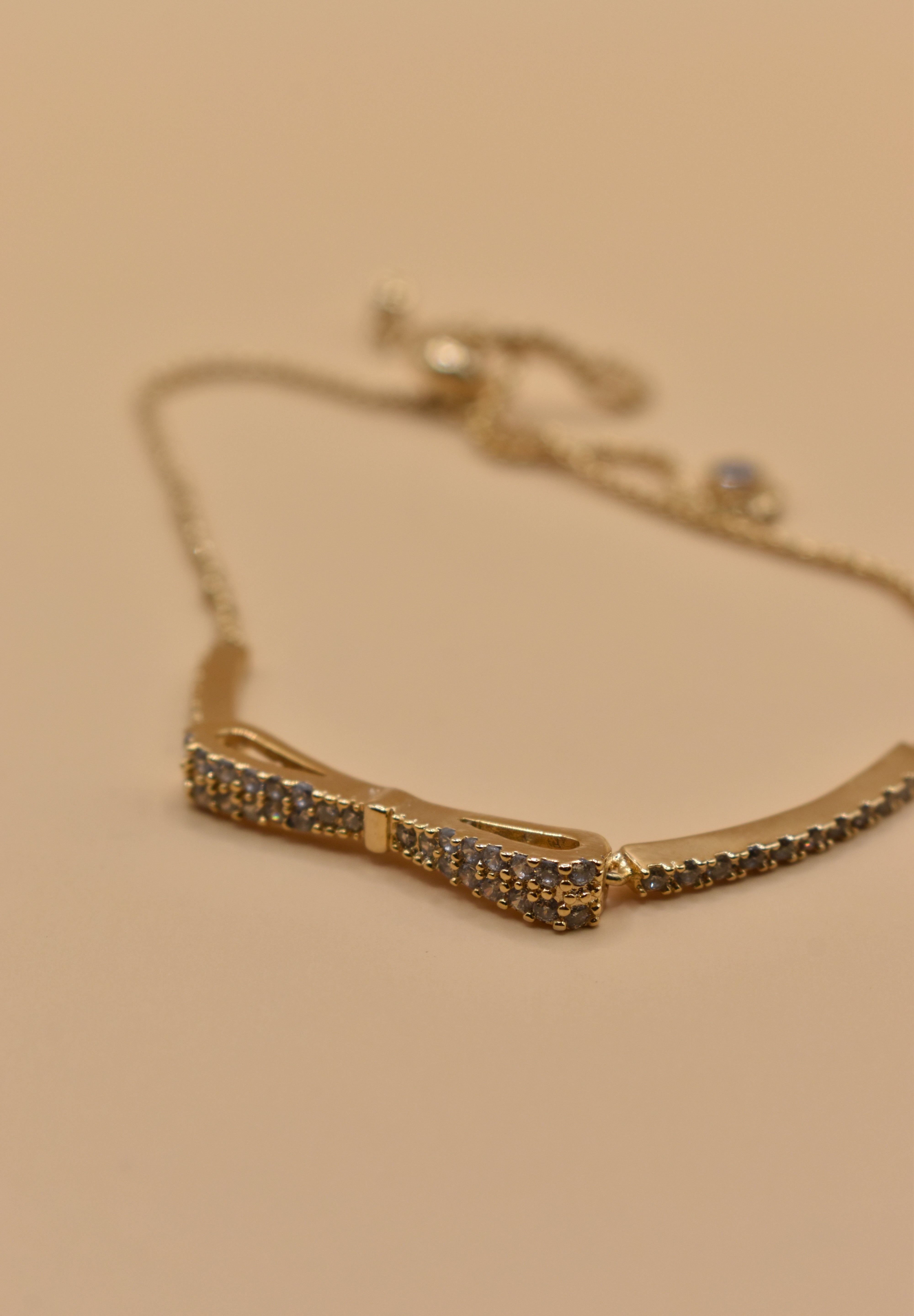 Gold Bow CZ Bracelet Adjustable with cubic zirconia charm