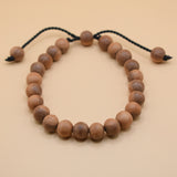 Adjustable handmade bead bracelet with wood accents
