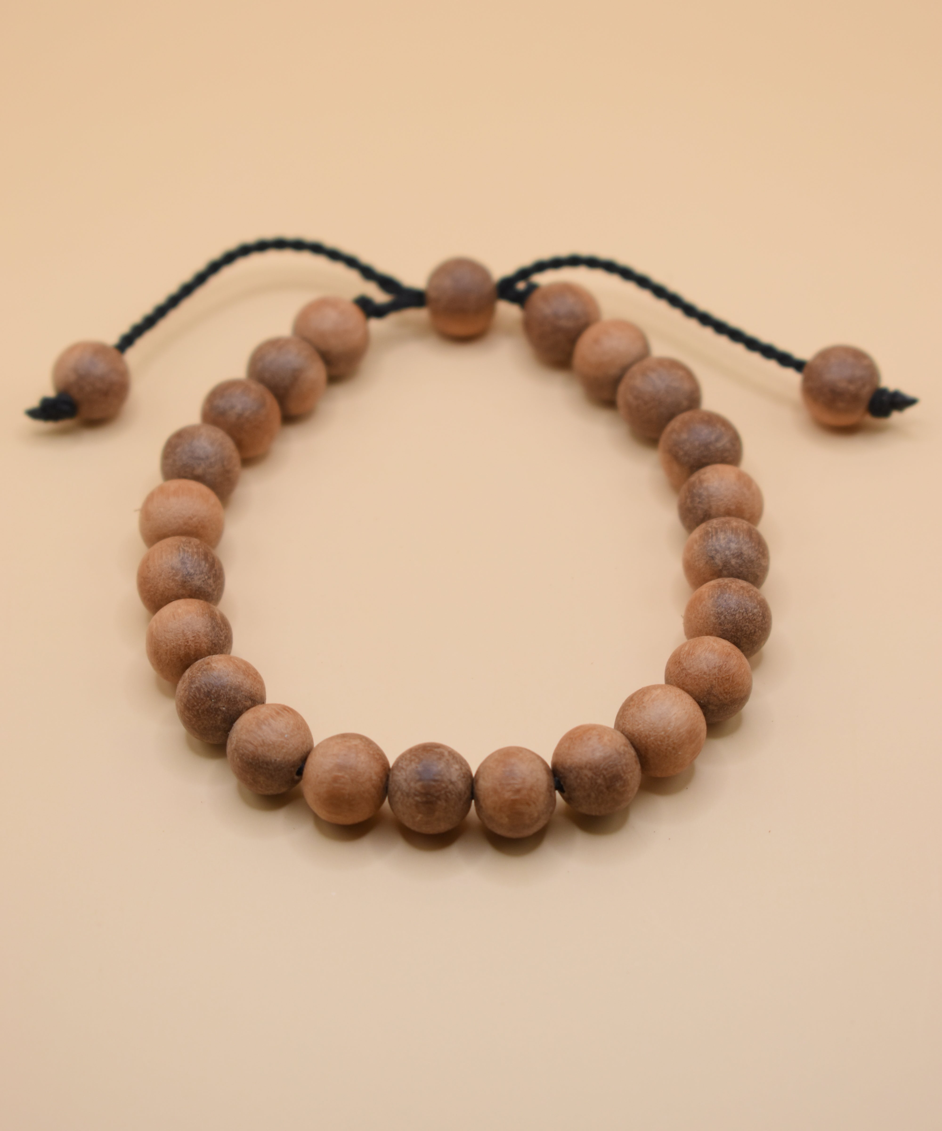 Adjustable handmade bead bracelet with wood accents