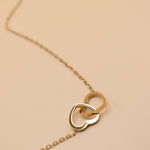 Twin Heart gold double heart necklace pendant