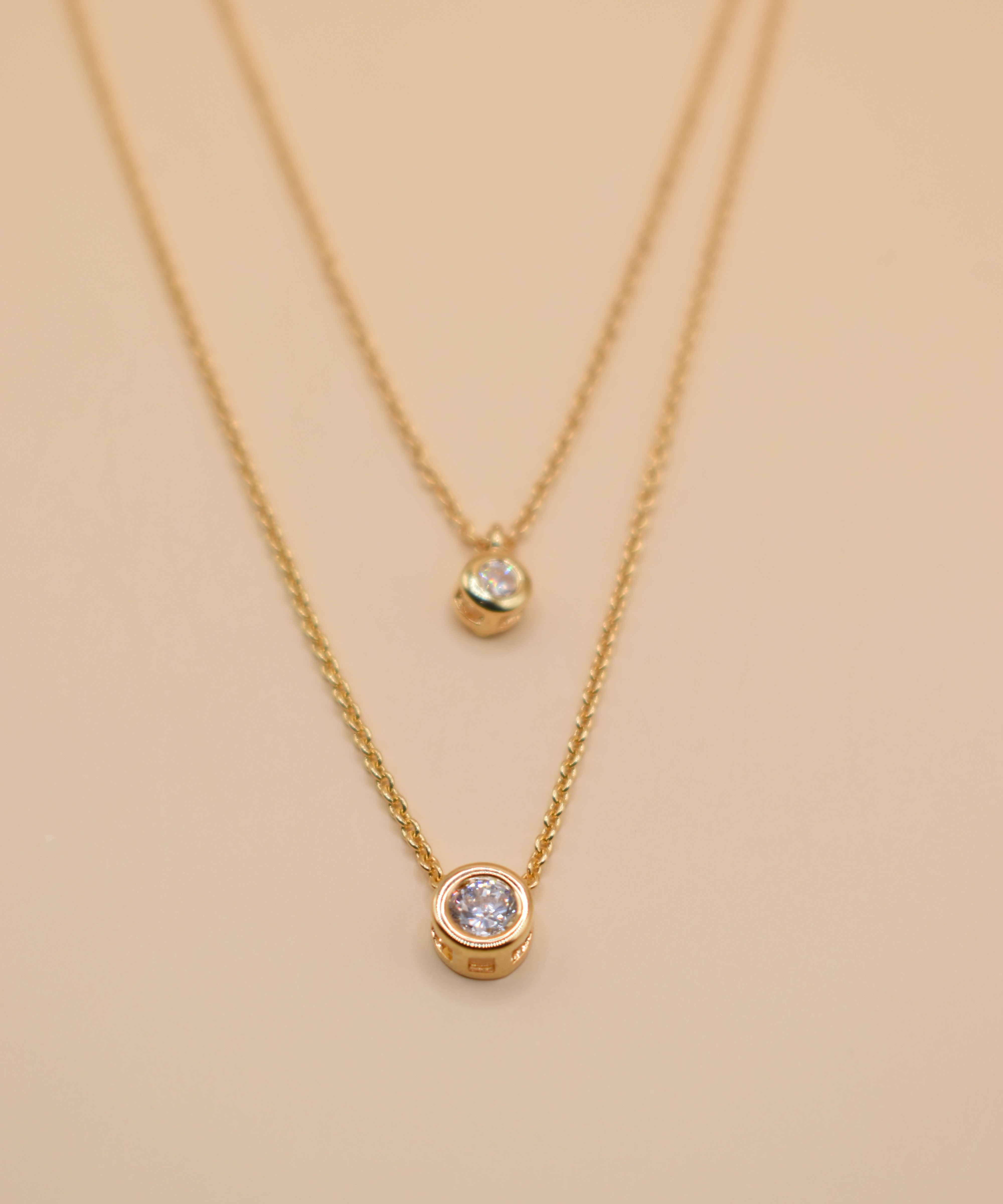Layered CZ cubic zirconia necklace with gold chain