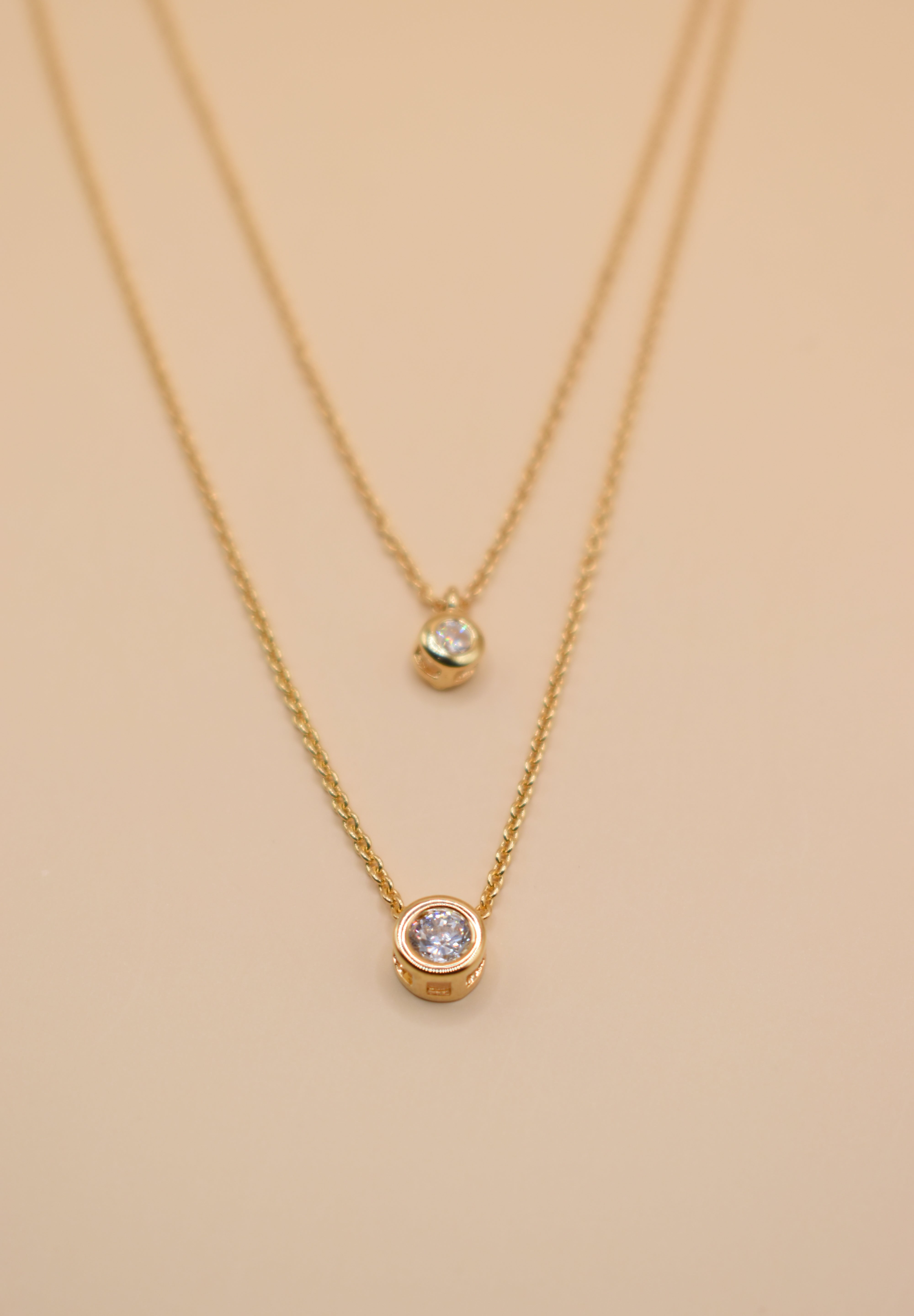 Layered CZ cubic zirconia necklace with gold chain