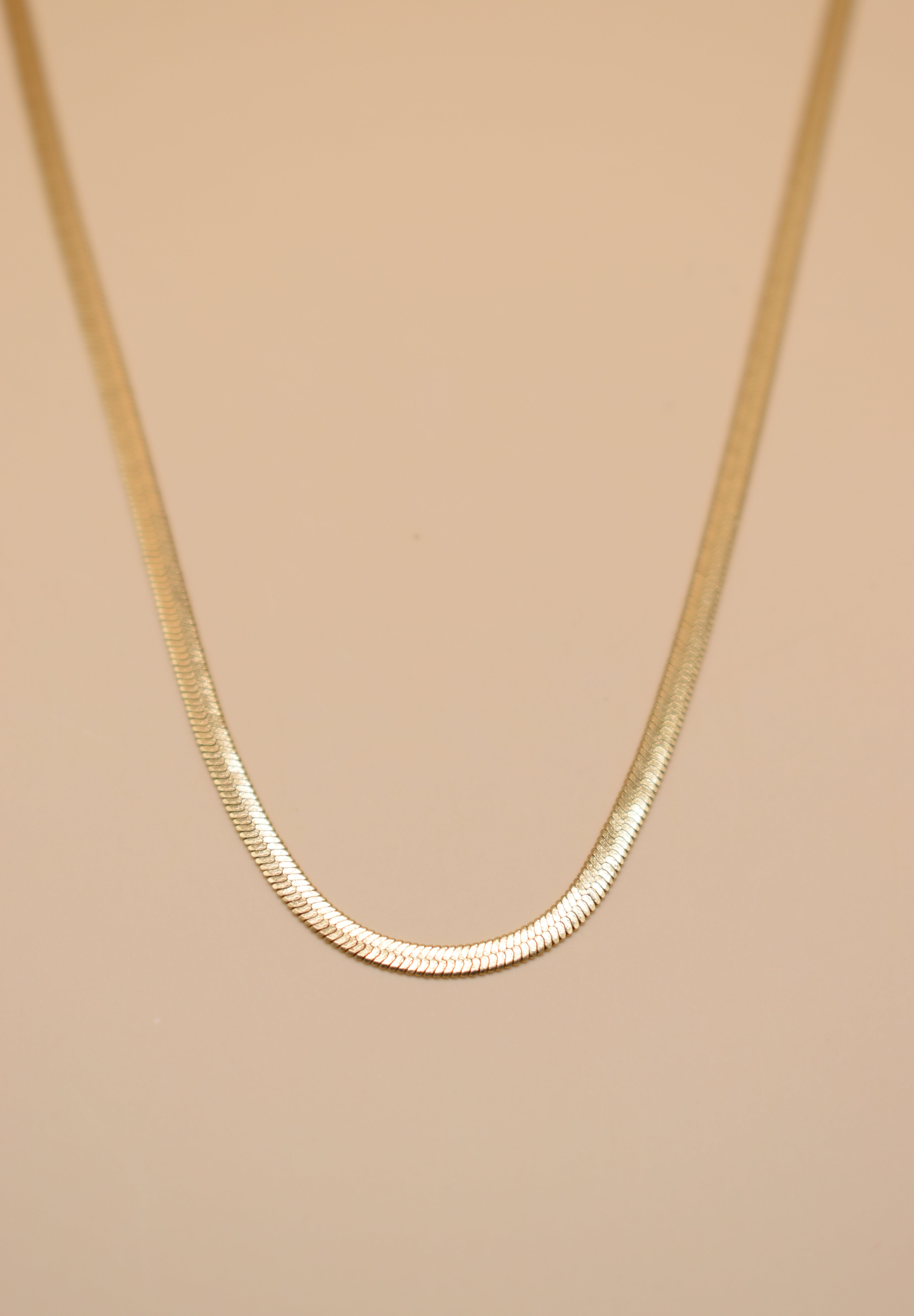 Gold herringbone chain necklace in stainless steel