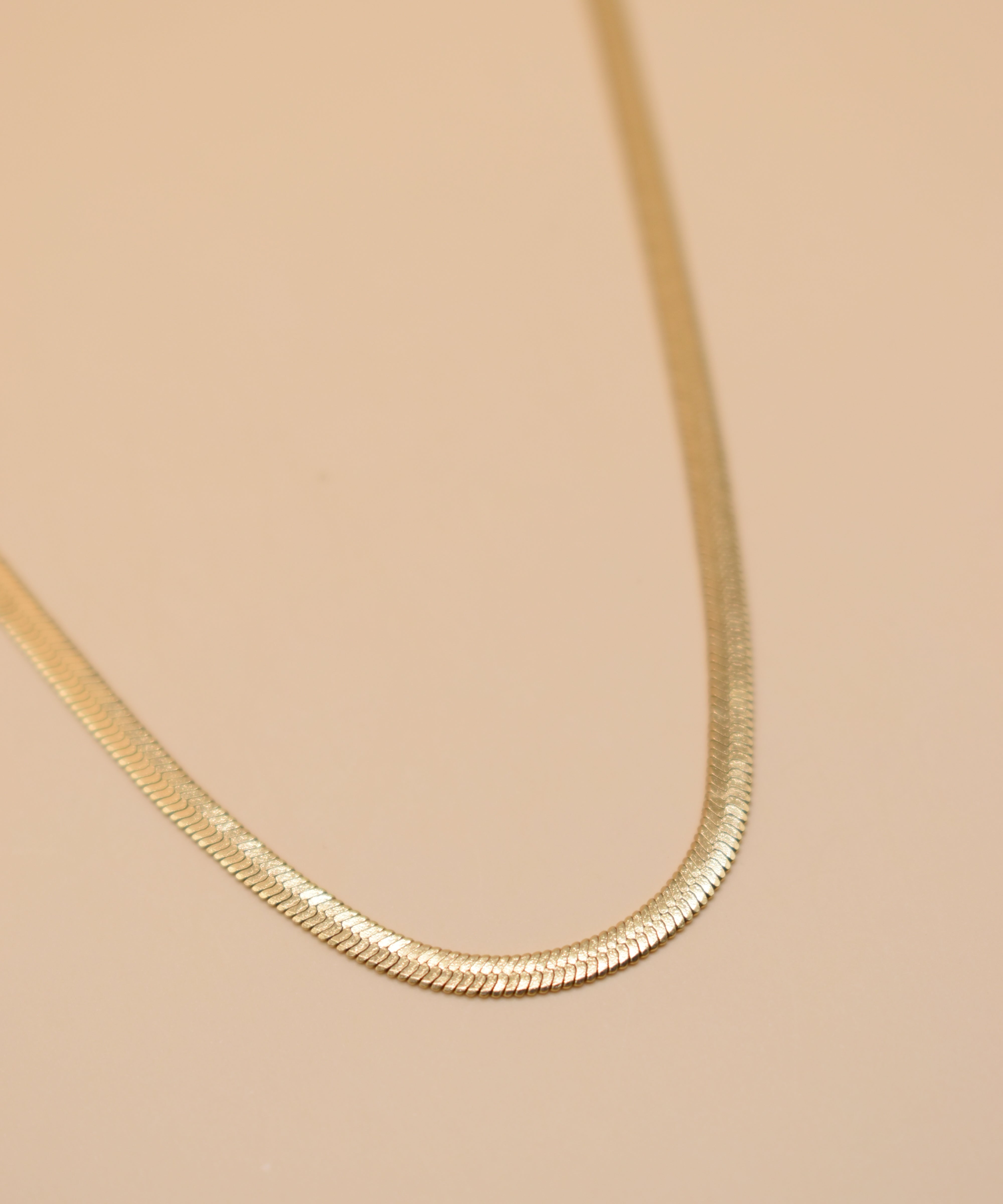 Gold herringbone chain necklace in stainless steel