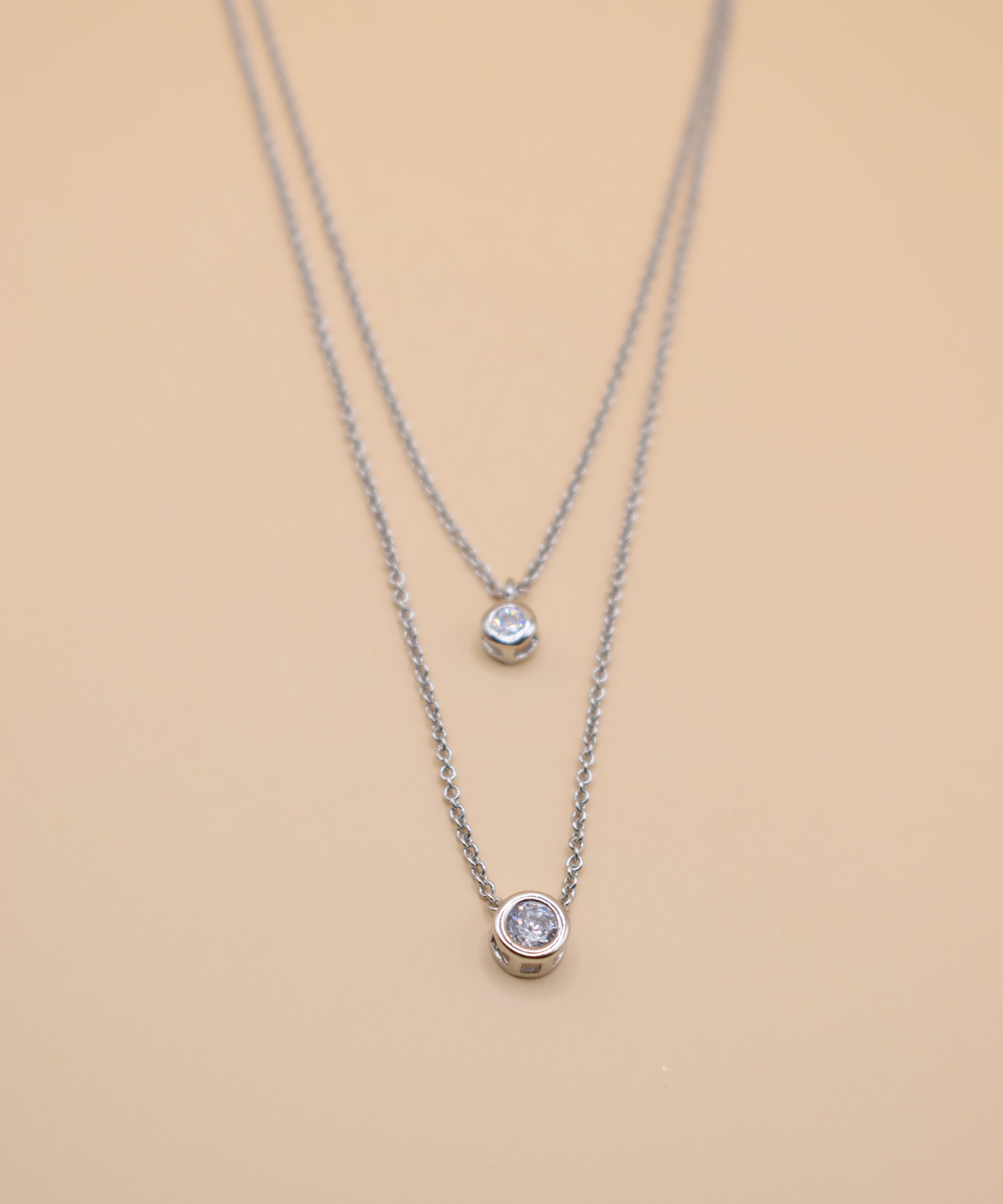 Layered CZ cubic zirconia necklace with gold chain
