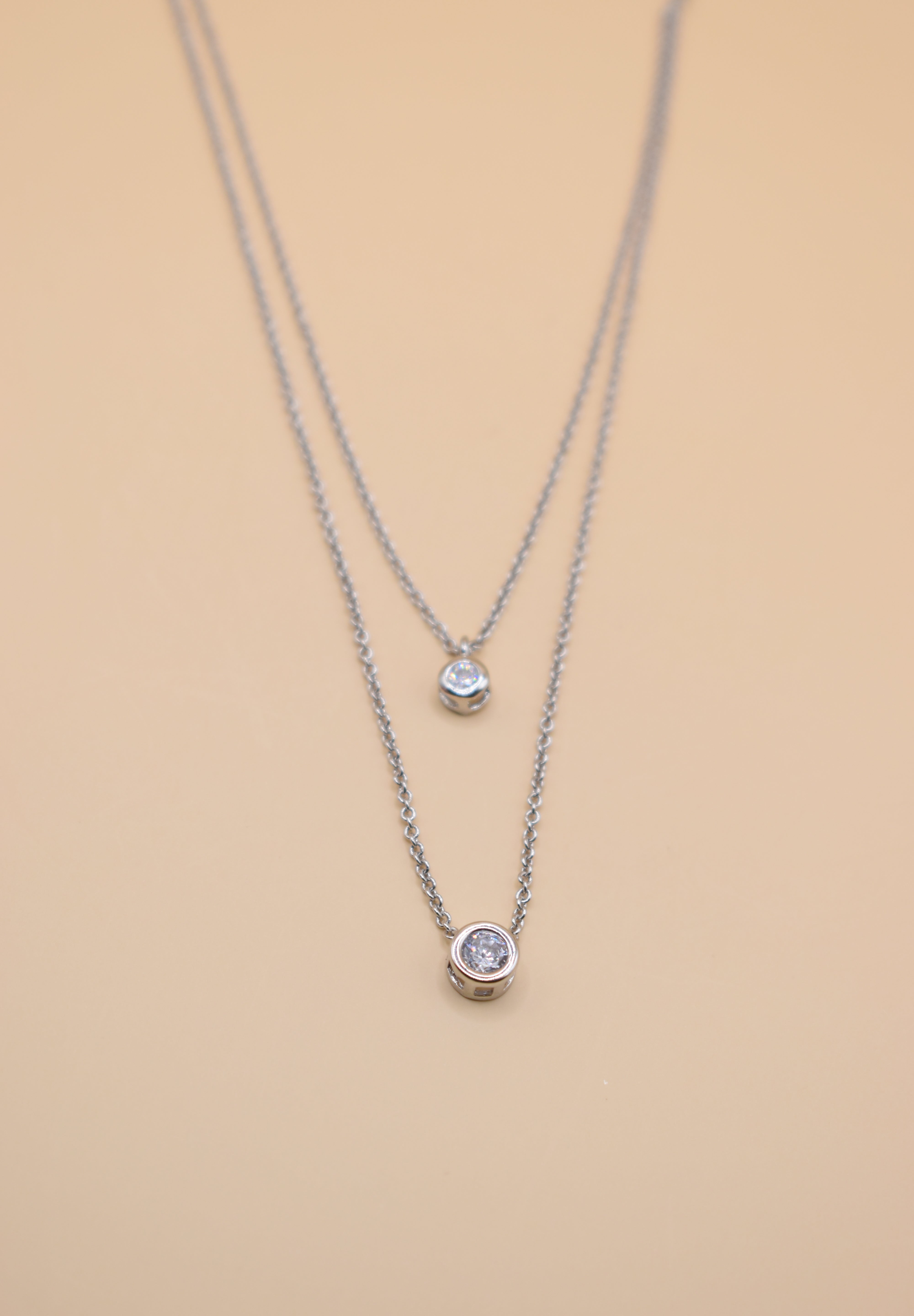 Layered CZ cubic zirconia necklace with gold chain