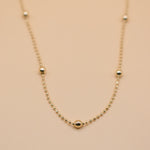 Gold ball chain necklace with alternating dainty spheres