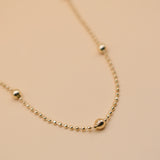 Gold ball chain necklace with alternating dainty spheres