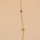 Gold ball chain necklace with alternating dainty spheres